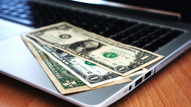 computer buy money banknotes